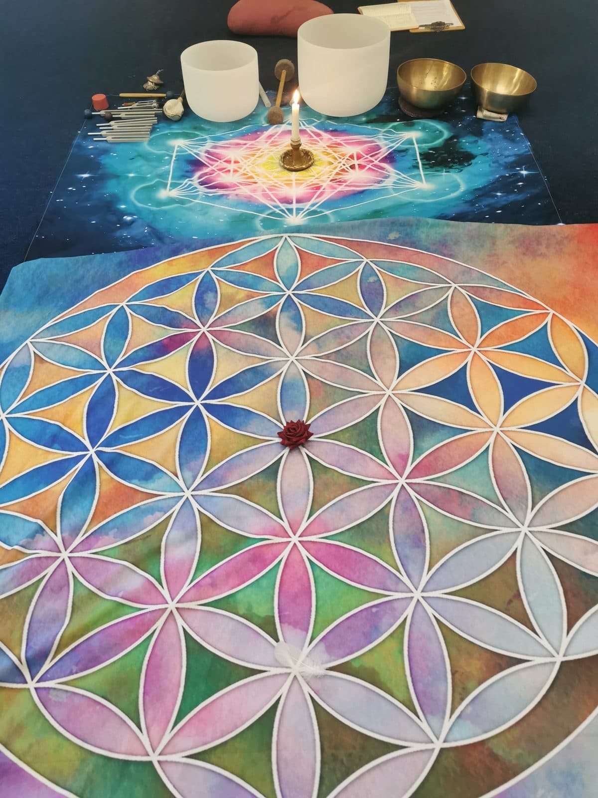 Crystal singing bowls and a sacred geometry cloth, part of Edel Garvey's sound healing practice